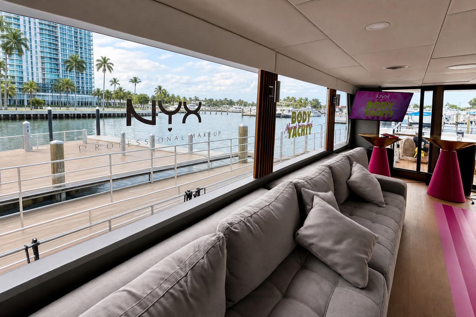 Frosted NYX Professional Makeup window vinyl and Body Yachty lounge branding on a Miami event yacht